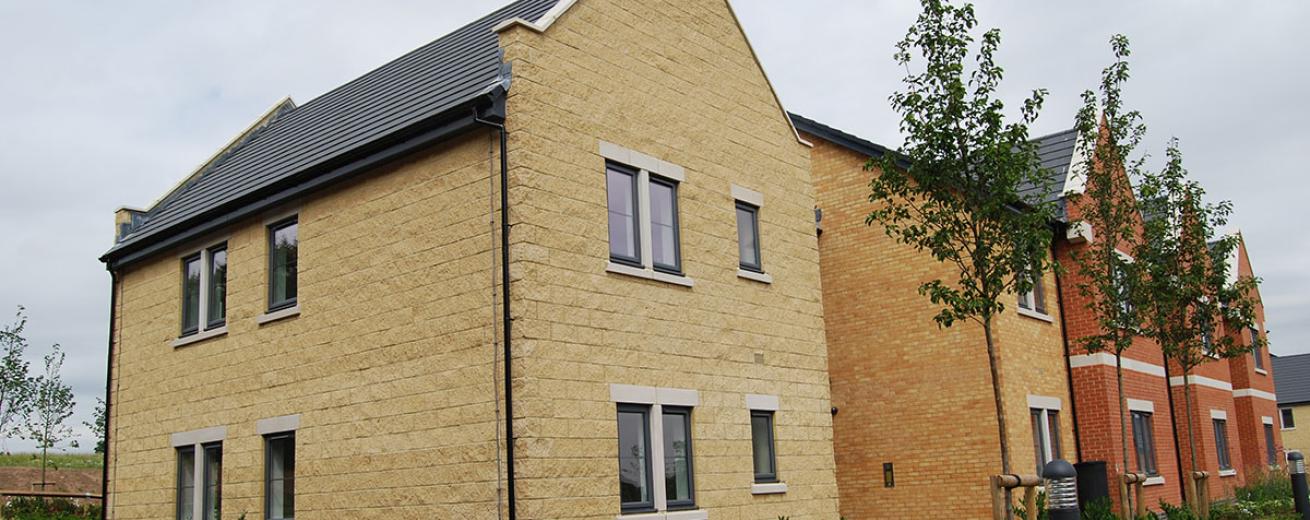 Contemporary stone and brick built properties split into apartments providing care and support for adults with learning disabilities.