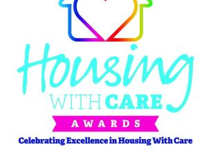 Colorful Housing with Care Awards finalist badge, featuring a house outline with a heart in gradient hues