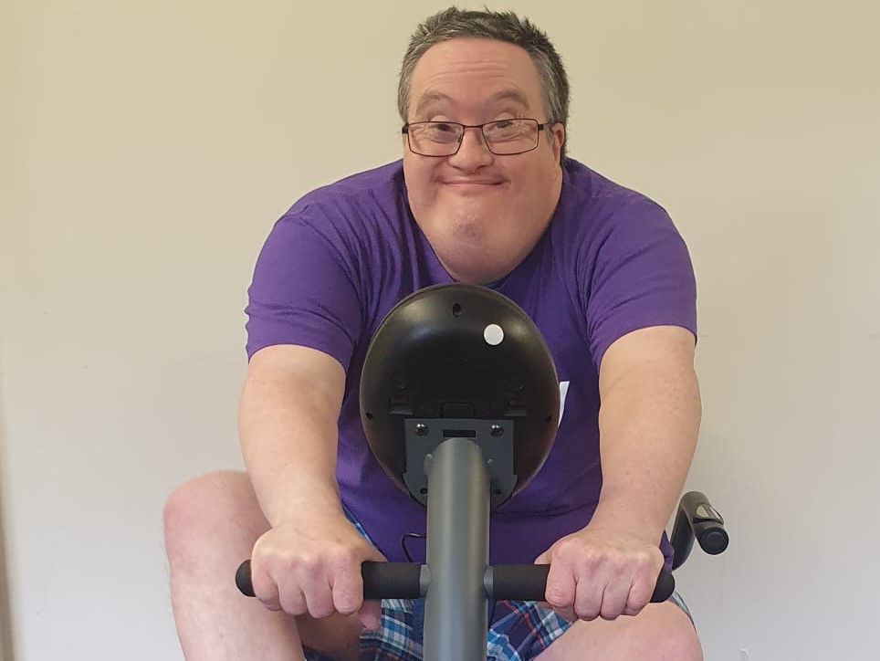 Tilmore Gardens resident exercising on an exercise bike 