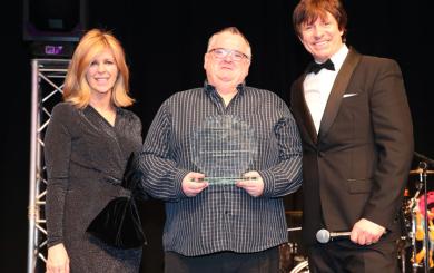Stephen Arrowsmith, Care Newcomer award winner with broadcaster Kate Garraway and presenter, Steve Walls