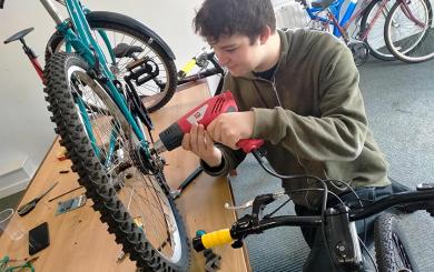 Resident Osric working on The Wheel Project at Brighton and Hove Foyer