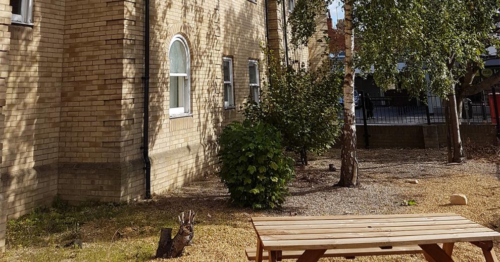 Well-maintained outdoor area with seating