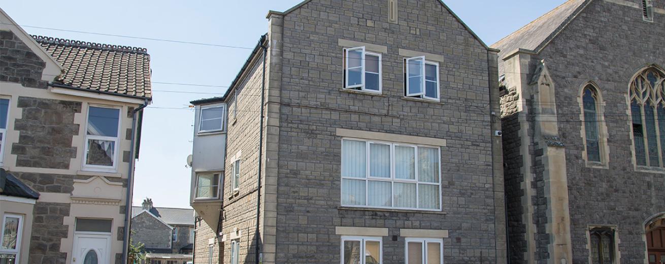 Charming limestone supported housing property at Moorland Road, with left side driveway access to rear parking.