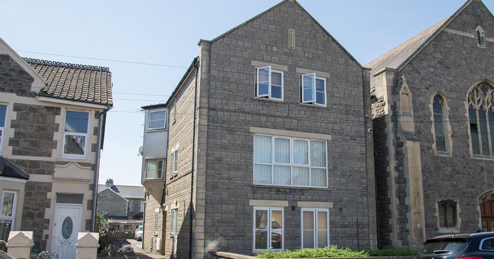 Charming limestone supported housing property at Moorland Road, with left side driveway access to rear parking.