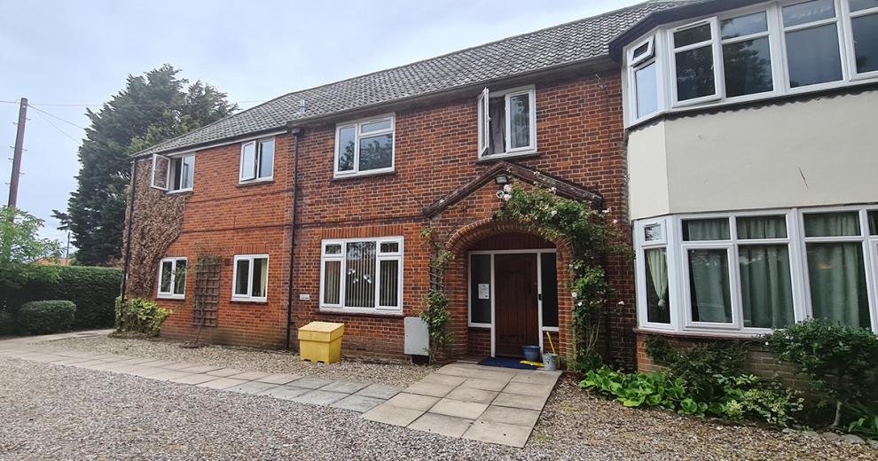 Traditional brick-built residence with rendered protruding bay windows, large arched porch to the entrance of the residence and a low maintenance block paving and stoned front garden.
