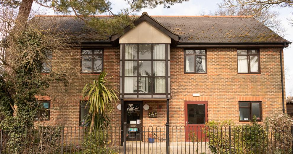 Large detached property with prominent second storey central window and added pointed roof feature. Which sits above the main entrance to the Old Milton Road shared house.