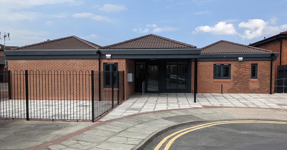 Modernised single storey bungalow, with a fenced patio area and off-road parking.