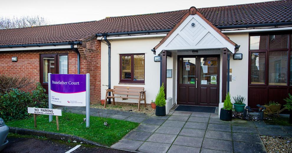 Single storey rendered, and brick built residential care home, Pennefather Court. The setback entryway has an enticing feel with the ageless brown and white décor.