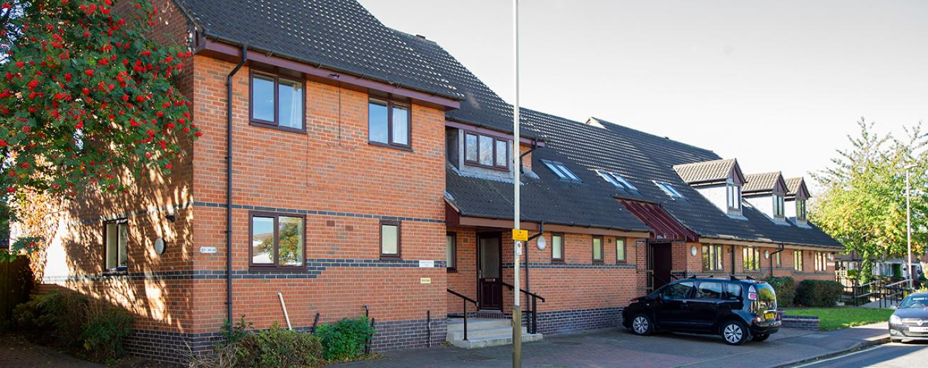 Multi elevation building design, fluctuating between two storey and single storey property with multiple entry points for all accessibility needs. Sycamore Court provides personal care for adults with a range of learning disabilities.
