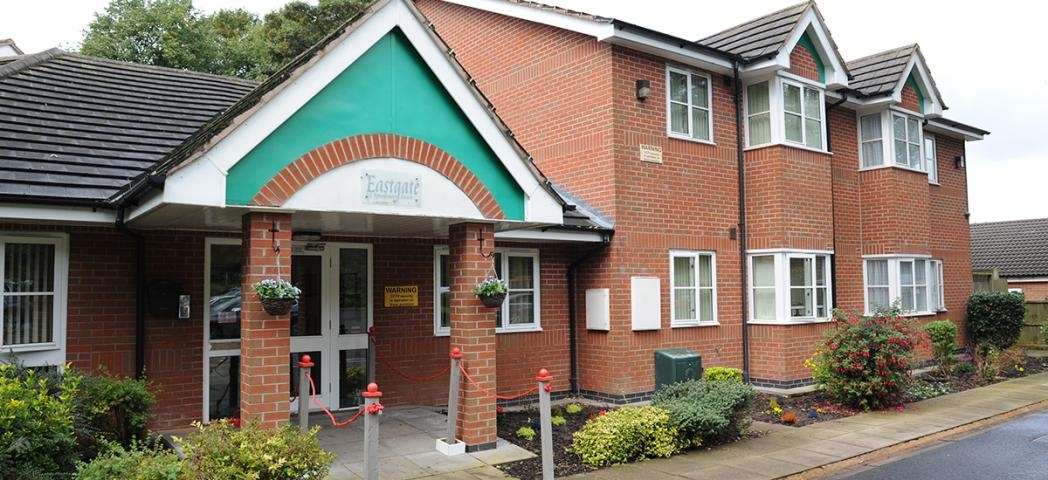 End of road, well-presented modern residential home with plenty of plants and flowers decorating the perimeter.