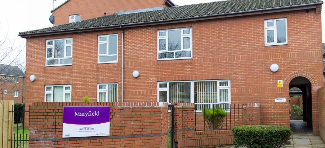 Sturdy newly built residential care facility in Swindon. The inviting exterior consists of secured gated garden area and built in archway leading through the length of the property. 