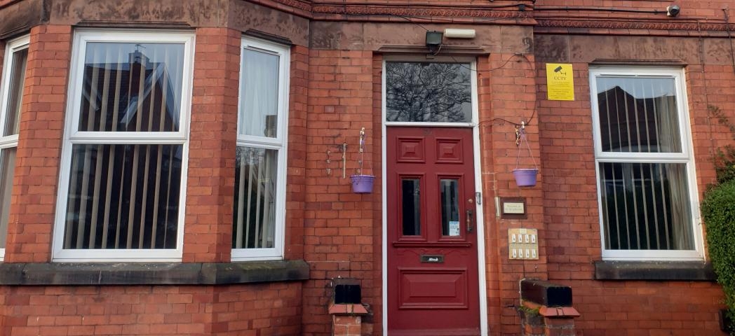 Conventional red bricked Victorian styled supported living home on Seabank Road.
