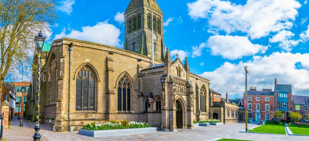 Gothic style cathedral located centrally with low maintenance gardens, walkways and seating.