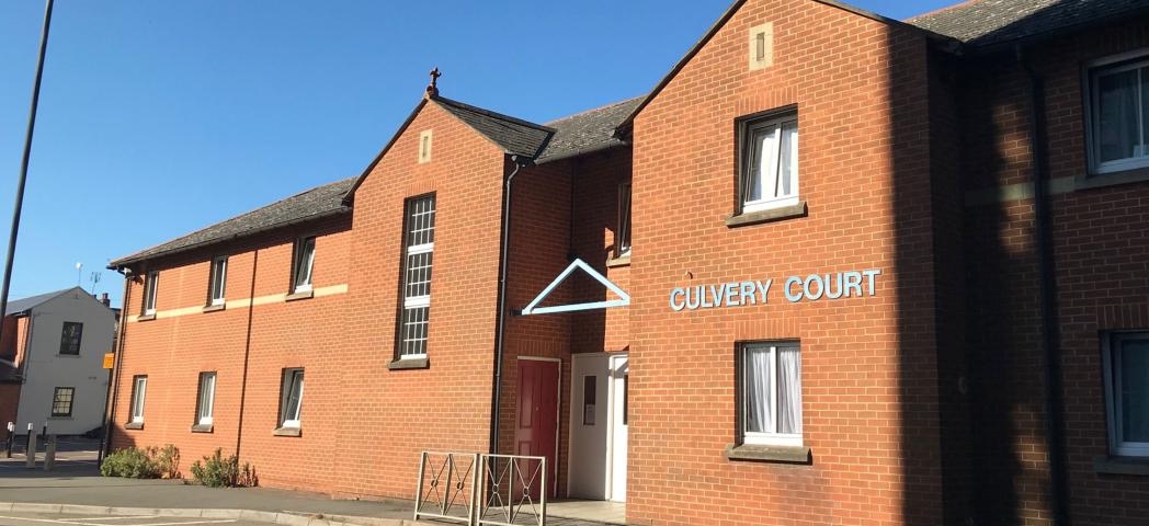 New build, red bricked two storey property. Based next to a quiet road, the metallic sign on the outside of the building keeps in theme with the modern feel.
