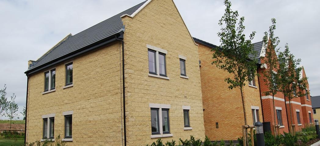 Contemporary stone and brick built properties split into apartments providing care and support for adults with learning disabilities.