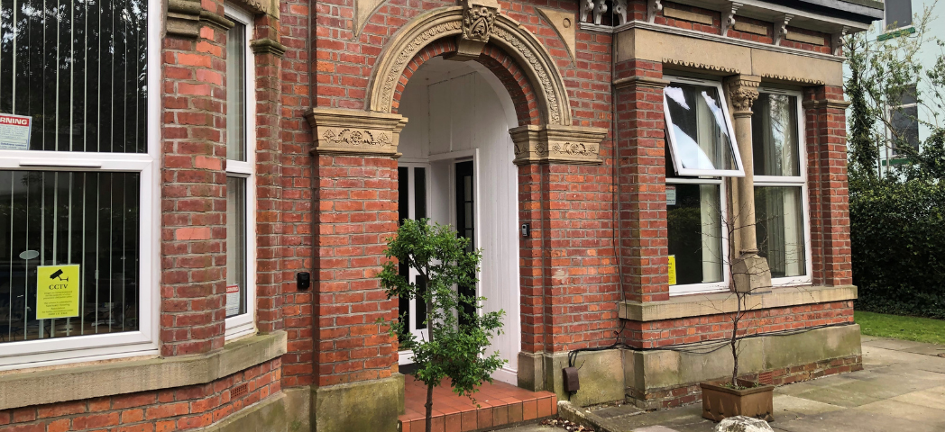 Red bricked entrance to Albert Road