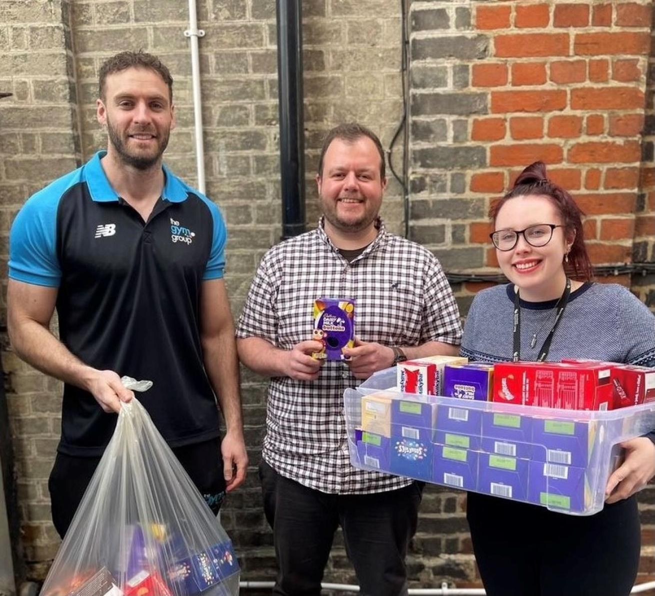 Gym volunteer with Project Workers from Cavendish Lodge with Easter egg donations