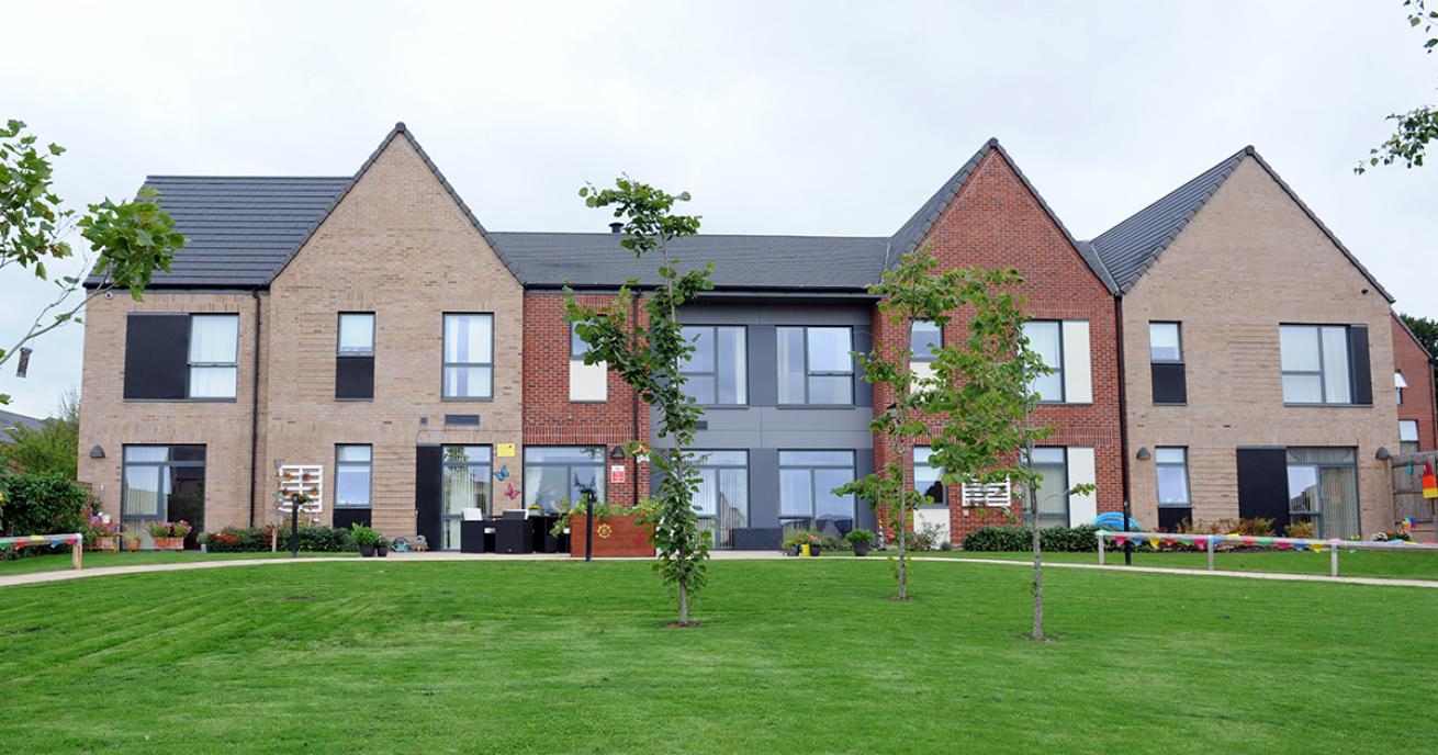 Stylish, new build property using a mixture of pointed and sloping roof styles, generous multi rectangular window frames allowing tonnes of natural light as well as lush grass communal area with trees and a curved walkway up to the entrances.  