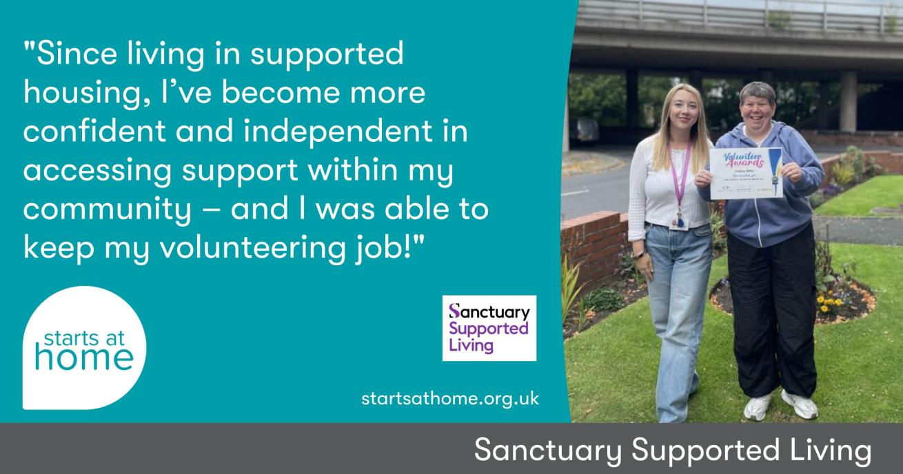 two women standing together, smiling and looking at the camera. A blonde woman on the left is wearing a white top and a purple lanyard, the woman on the right is holding up a certificate that reads volunteer awards.