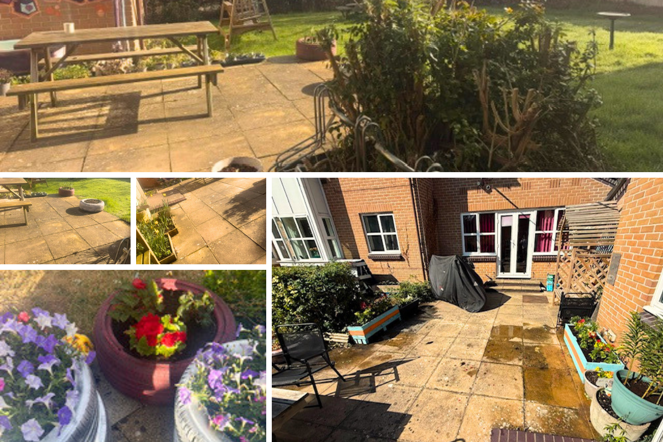 Cloverdale's submission shows their stone patio surrounded by lush plants and flowers. They have also repurposed some brightly painted tires into plant pots for bright flowers.