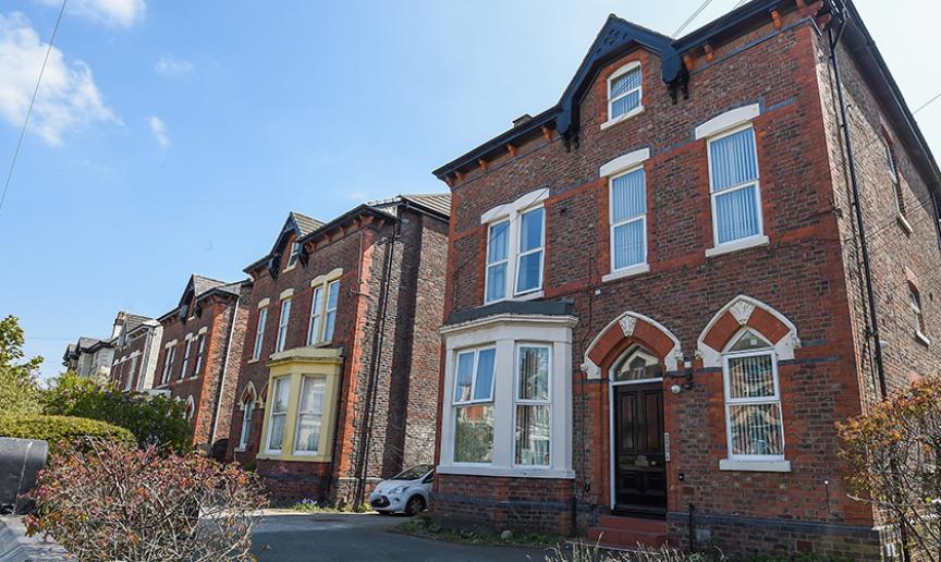 Detached three storey brick building with front garden, containing nine single-occupancy en-suite bedrooms to support adults with a range of mental health needs on the Alexandra Road.