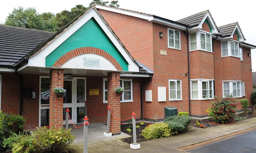 End of road, well-presented modern residential home with plenty of plants and flowers decorating the perimeter.