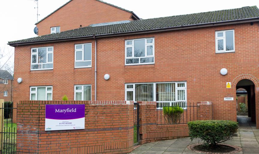 Sturdy newly built residential care facility in Swindon. The inviting exterior consists of secured gated garden area and built in archway leading through the length of the property. 