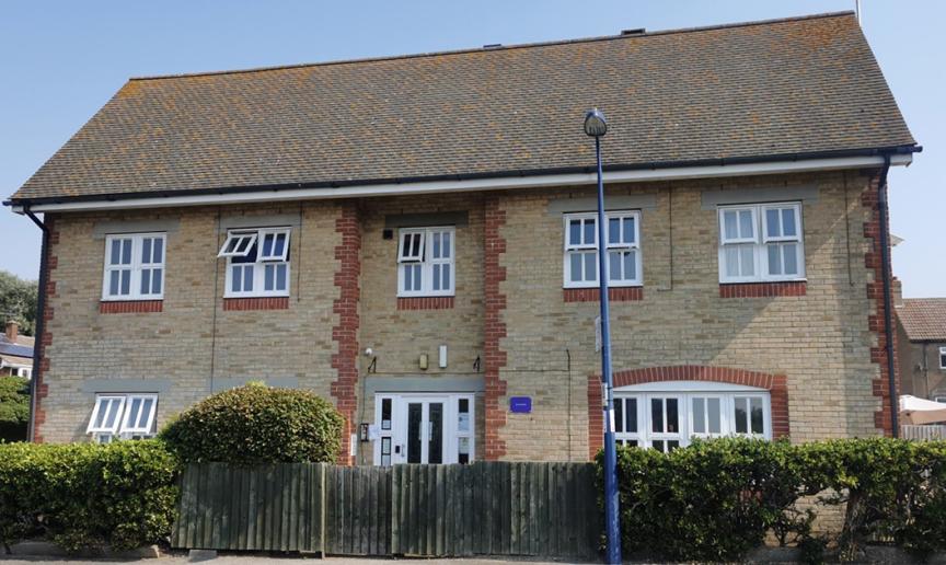 Cottage style two storey property, with indented front door entry to the supported housing residence.