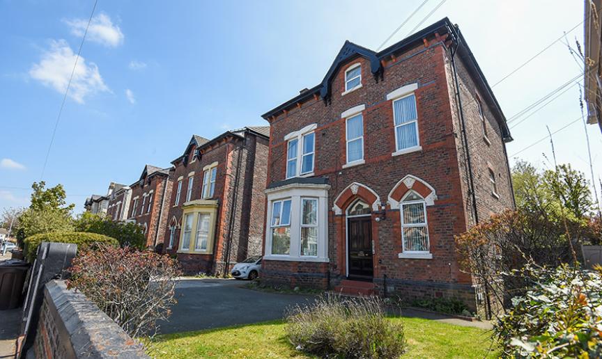 Detached three storey brick building with front garden, containing nine single-occupancy en-suite bedrooms to support adults with a range of mental health needs on the Alexandra Road.