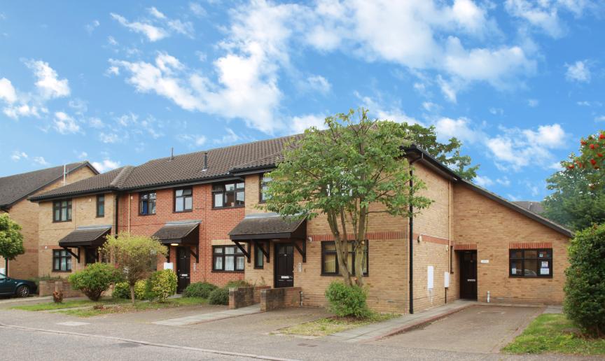 Contemporary brick-built dwelling with adjoining single storey set back addition with 45 degree angle roof seamlessly blending into the roof space of the home. Housing two off road car parking space for the supported living dwelling on Nickleby Road.