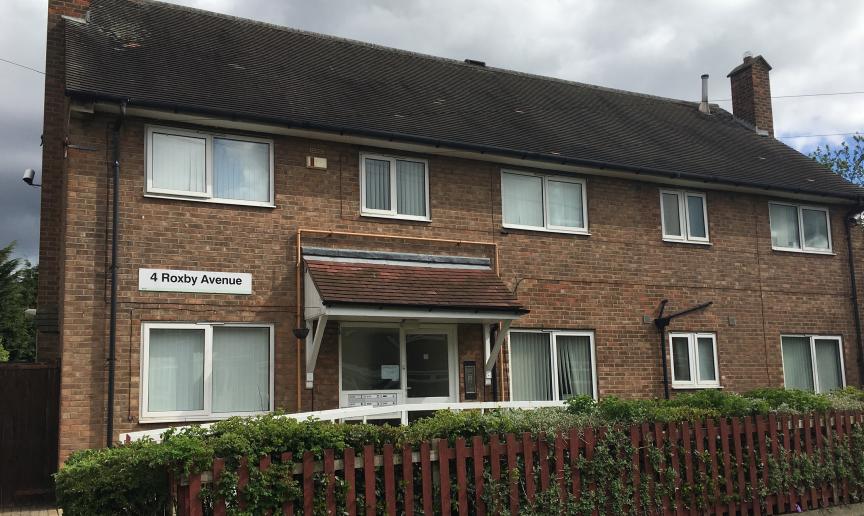 Conventional 50’s style brick shared house for people aged 16 and over, with a range of learning disabilities. Hosting disabled access and privacy from a mahogany picket fence and shrubbery.
