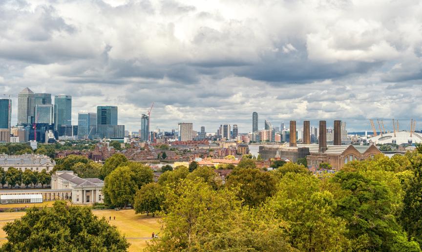 Panoramic views of Greenwich Park and National Maritime Museum, Gardens, University of Greenwich, Old Royal Naval College, River Thames, and the city of London.