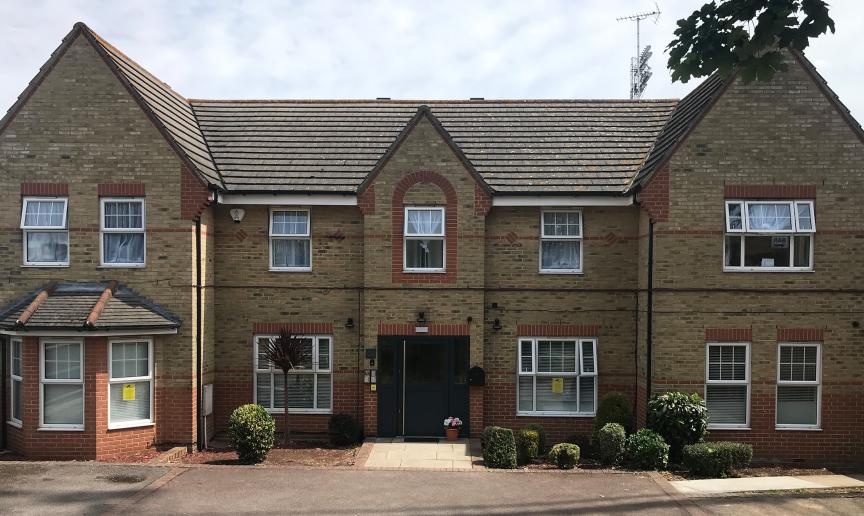 The broad property has a setback entrance way lined with small shrubbery plants providing entry to the young parents supported housing in Southend on Sea.  