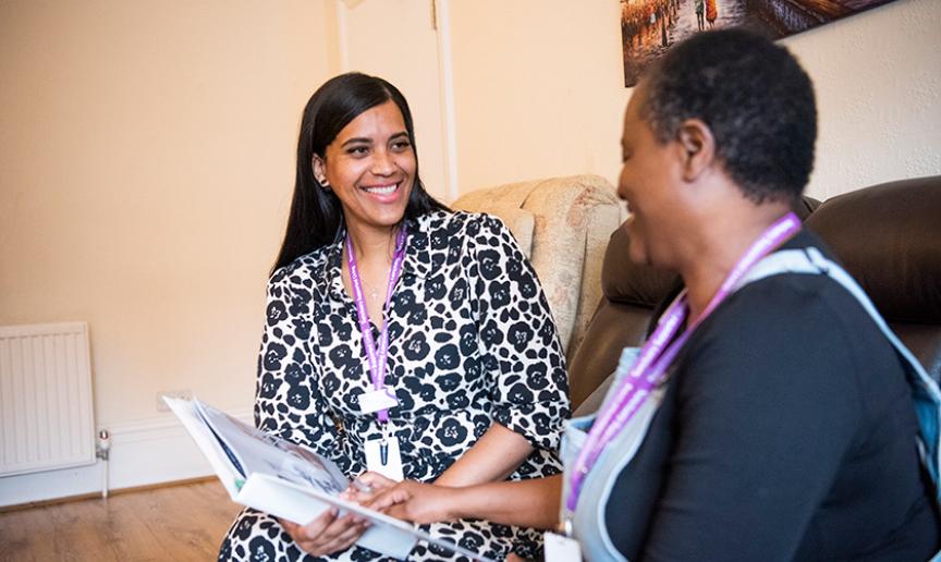 Staff and customer working through a support plan