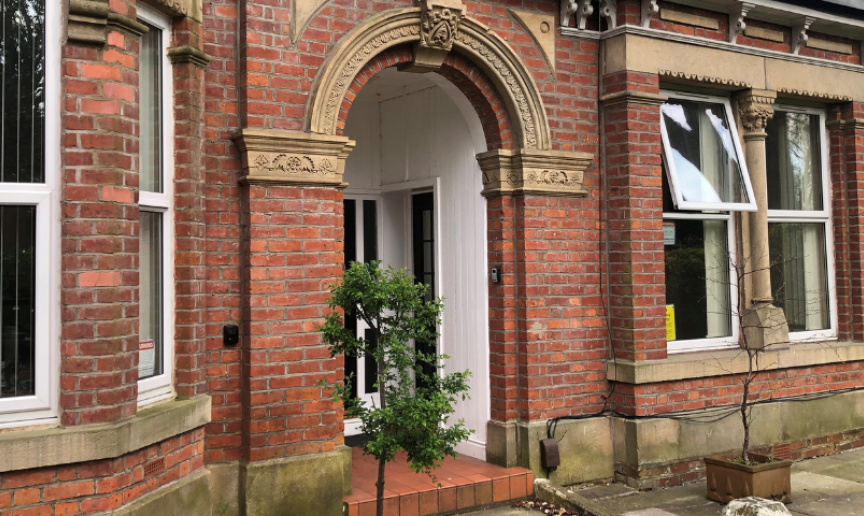 Red bricked entrance to Albert Road