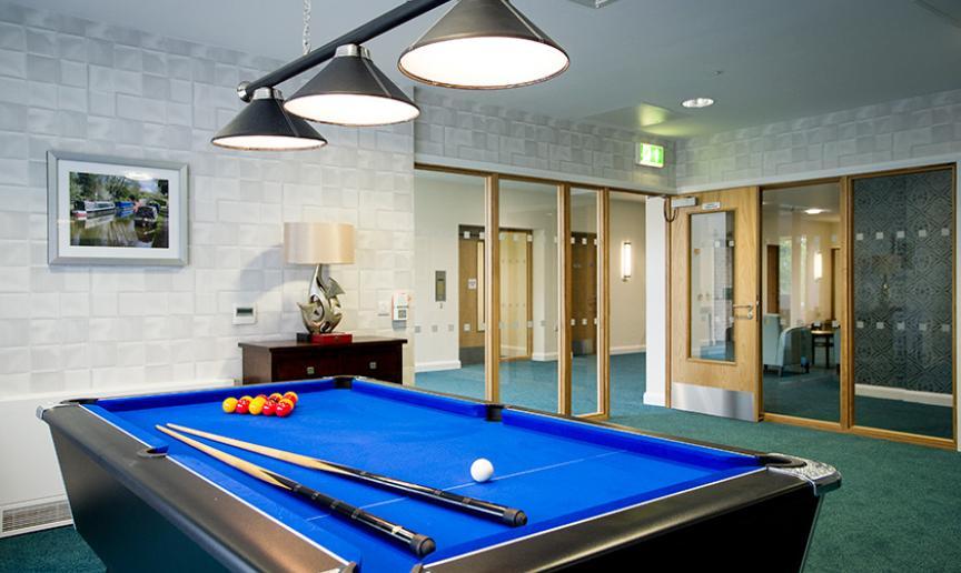 Pool table and games room at a Supported Living service