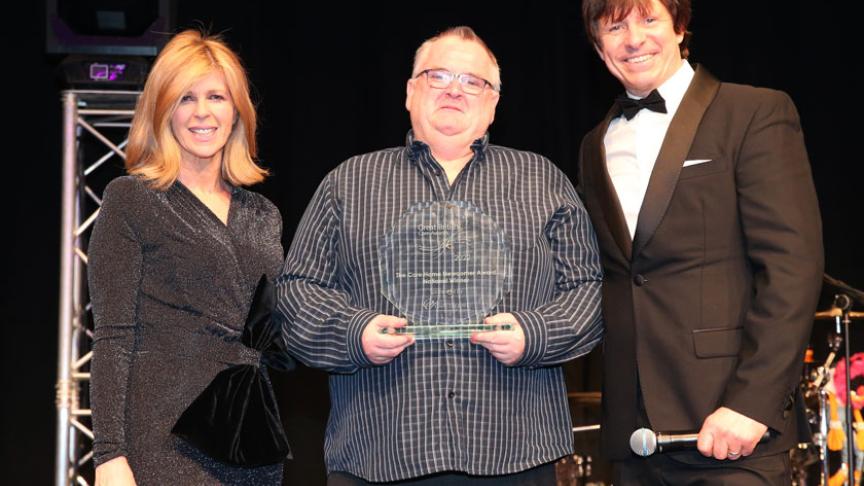Care Newcomer award winner with broadcaster Kate Garraway and presenter, Steve Walls