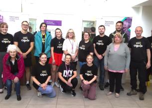 McCains Volunteers at Jazz Court posing for photo
