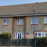 Cottage style two storey property, with indented front door entry to the supported housing residence.