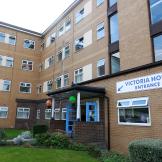 Four storey apartment building offering accommodation to adults that are homeless, experiencing housing related crisis or are in need of temporary housing and support at Victoria House.