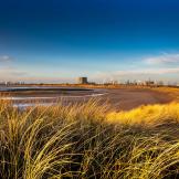 Golden sand dunes surrounding the port on the river Tees.
