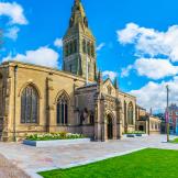 Gothic style cathedral located centrally with low maintenance gardens, walkways and seating.