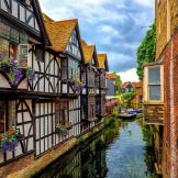 Medieval half-timber houses built on the river with boat access and mooring.