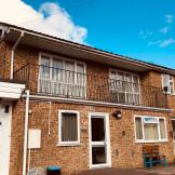 50’s styled terraced property with multiple entry points and plenty of large PVC windows which proactively supports adults who require mental health support in Winchester.
