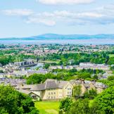 The cityscape of Lancaster, with Morecambe Bay in the background.