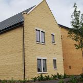 Contemporary stone and brick built properties split into apartments providing care and support for adults with learning disabilities.