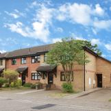 Contemporary brick-built dwelling with adjoining single storey set back addition with 45 degree angle roof seamlessly blending into the roof space of the home. Housing two off road car parking space for the supported living dwelling on Nickleby Road.