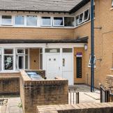 Traditional brick built end of terrace corner plot property. The front of the property has a small courtyard area with storage for disposal facilities. The courtyard is enclosed by a brick built wall and small waist heigh iron gate.